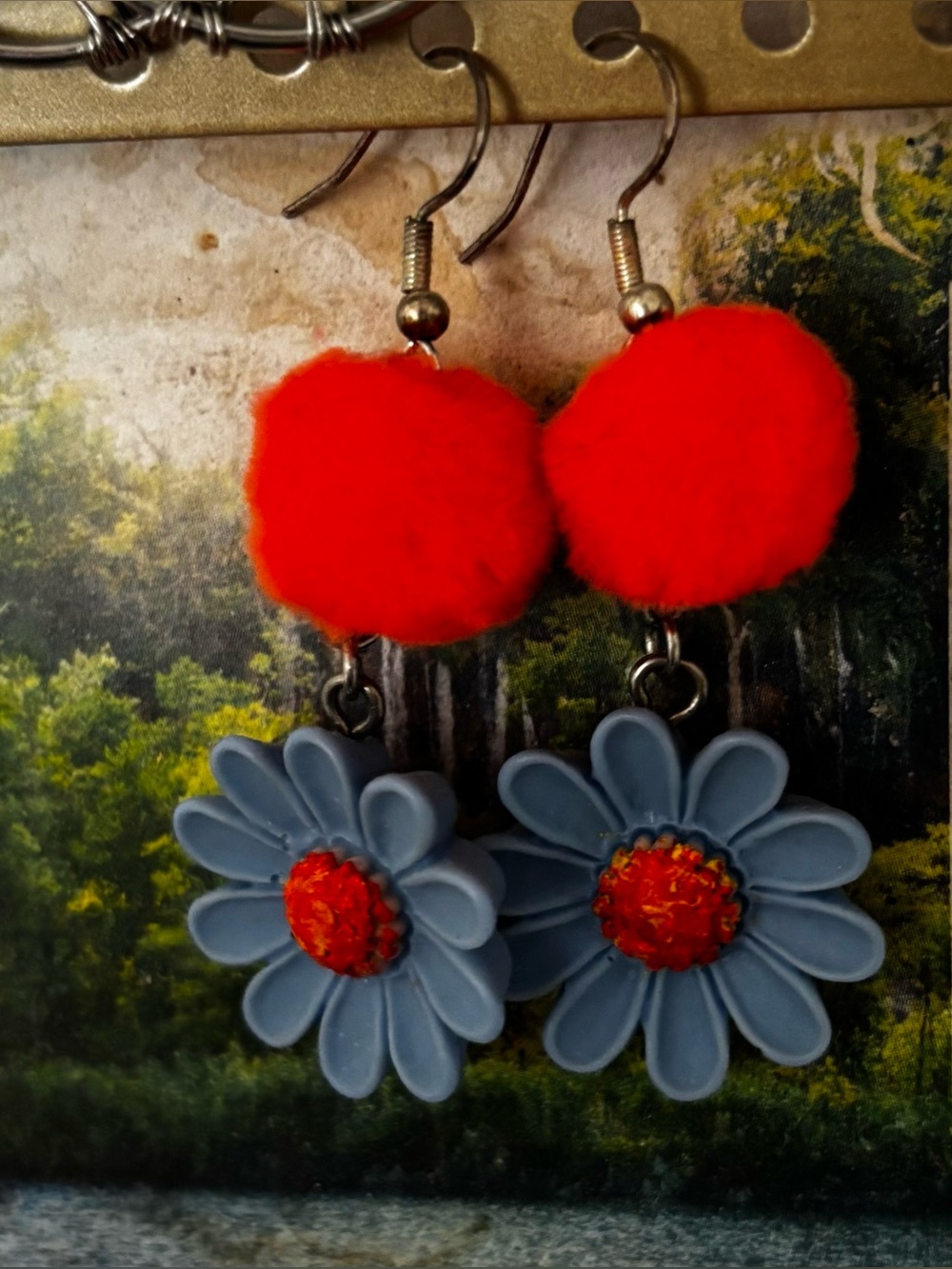 Blue Daisy Drop Earrings with Red Pom-Pom Accents